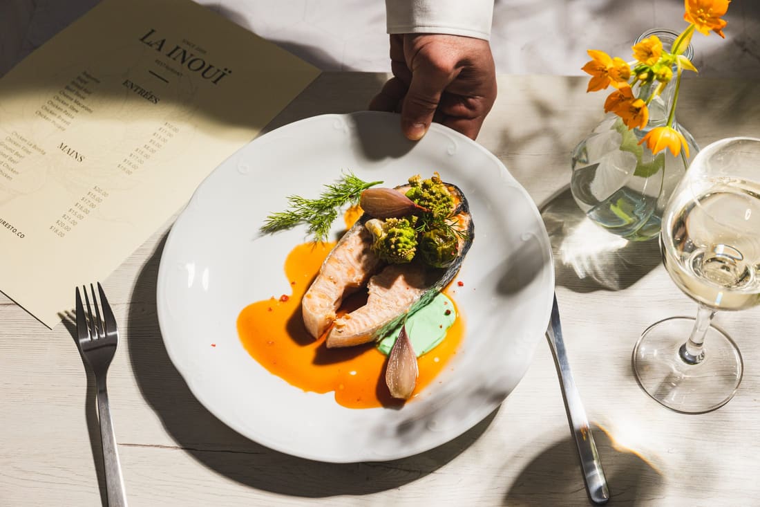 Plated main course served at a set table